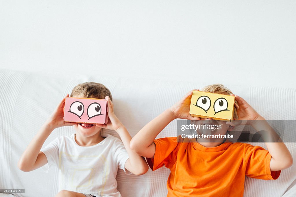 Children playing with Virtual Reality Headsets