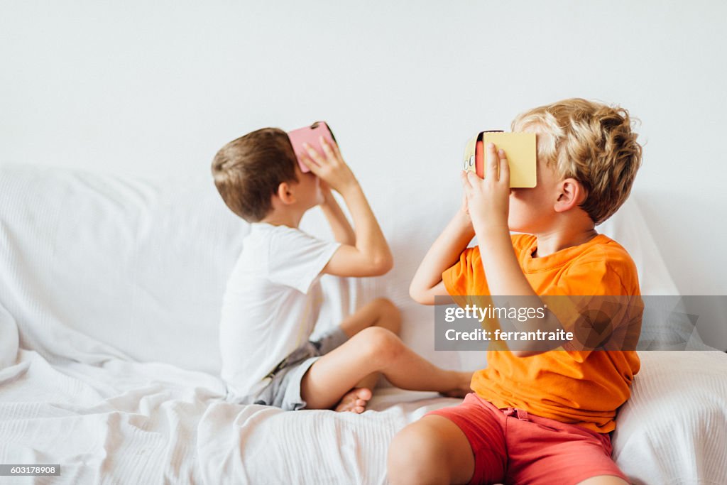 Children playing with Virtual Reality Headsets