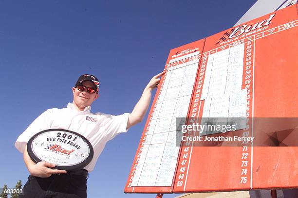Jason Leffler claims the Bud Pole award in his Ganassi Racing Dodge Intrepid during qualifying for the NASCAR Winston Cup Series Protection One 400...