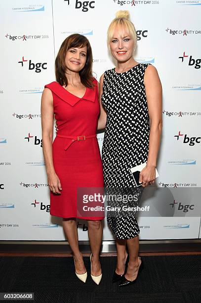 Actresses Carla Gugino Malin Akerman attend Annual Charity Day hosted by Cantor Fitzgerald, BGC and GFI at BGC Partners, INC on September 12, 2016 in...