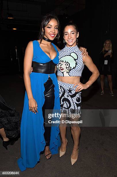 Tinashe and Aly Raisman pose during New York Fashion Week: The Shows at Skylight at Moynihan Station on September 12, 2016 in New York City.