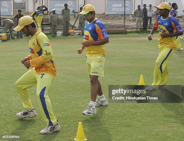 Cricket - Team Chennai's captain MS Dhoni and other players during the net practice session on the eve of their match against Team Hyderabad at Rajiv...