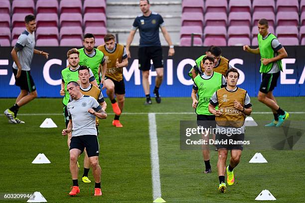 Celtic FC players warm up during a training session ahead of the UEFA Champions League Group C match against FC Barcelona at Camp Nou on September...