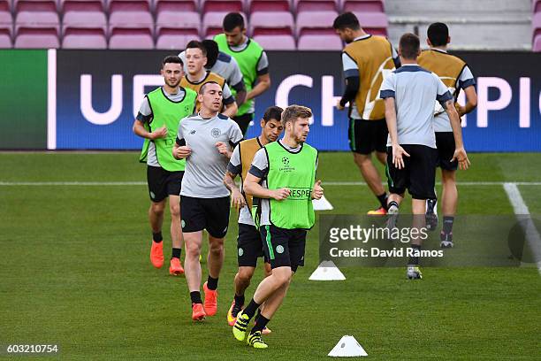 Celtic FC players warm up during a training session ahead of the UEFA Champions League Group C match against FC Barcelona at Camp Nou on September...