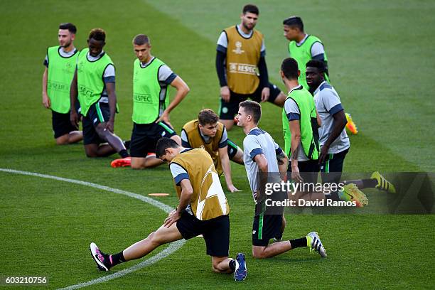 Celtic FC players warm up during a training session ahead of the UEFA Champions League Group C match against FC Barcelona at Camp Nou on September...