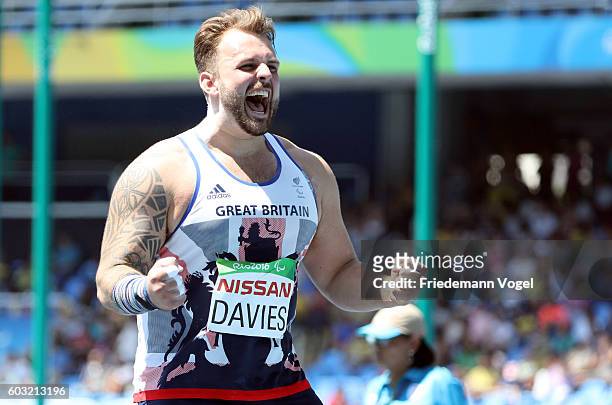 Aled Davies of Great Britain celebrates winning the Men's Shot Put F42 at Olympic Stadium during day 5 of the Rio 2016 Paralympic Games on day 5 of...