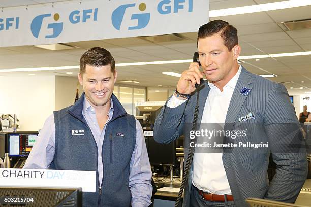 Professional football player Steve Weatherford participates in the Annual Charity Day hosted by Cantor Fitzgerald, BGC and GFI at GFI Securities on...