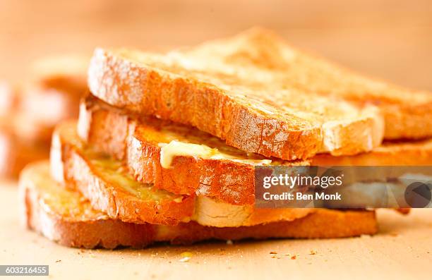 stack of buttered toast - toasted bread stock-fotos und bilder