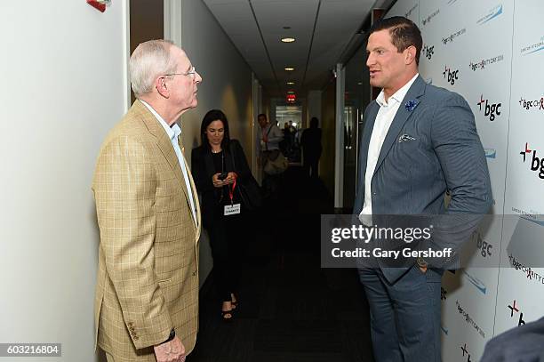 Former NY Giants coach Tom Coughlin and NFL player Steve Weatherford attends Annual Charity Day hosted by Cantor Fitzgerald, BGC and GFI at BGC...