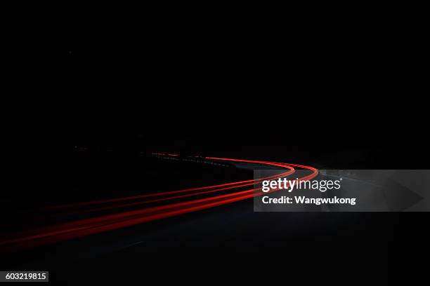 red ribbon - light trail imagens e fotografias de stock