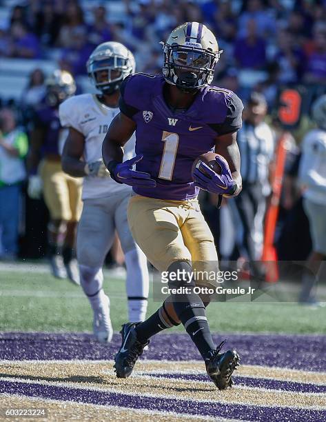 Wide receiver John Ross of the Washington Huskies scores a touchdown in the second quarter against the Idaho Vandals on September 10, 2016 at Husky...