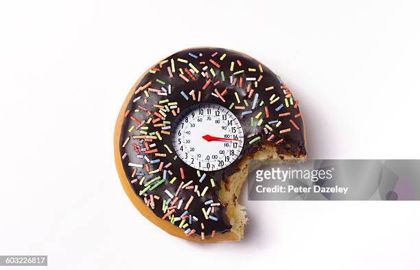 doughnut with weighing scales - plain donut stock pictures, royalty-free photos & images