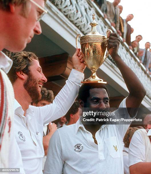 Viv Richards and Ian Botham of Somerset celebrate after winning the Benson and Hedges Cup Final between Somerset and Surrey at Lord's Cricket Ground,...