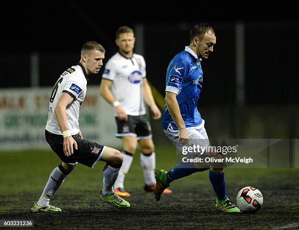 Dundalk , Ireland - 12 September 2016; David Scully of Finn Harps in action against Ciaran Kilduff of Dundalk during the SSE Airtricity League...