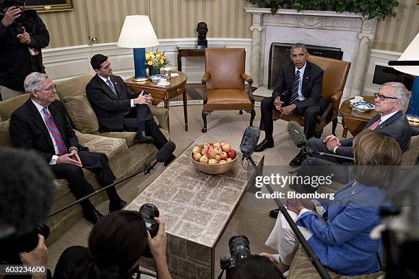 President Barack Obama, center, speaks as Senate Majority Leader Mitch McConnell, a Republican from Kentucky, from left, U.S. House Speaker Paul...