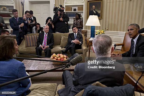 President Barack Obama, right, speaks as Senate Majority Leader Mitch McConnell, a Republican from Kentucky, from left, U.S. House Speaker Paul Ryan,...