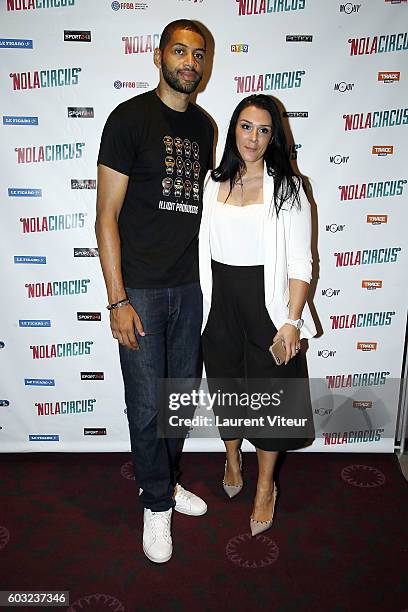 Player Nicolas Batum and his partner Aurelie Etchart attend the 'Nola Circus' Paris Premiere at Gaumont Opera Capucines on September 12, 2016 in...