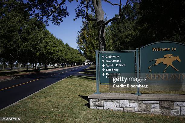 Signage is displayed outside the entrance to Keeneland Racecourse during the 2016 September Yearling Sale in Lexington, Kentucky, U.S., on Monday,...