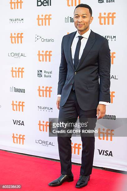 John Legend arrives for the premiere of "La La Land" at the Toronto International Film Festival in Toronto, Ontario, September 12, 2016. / AFP /...