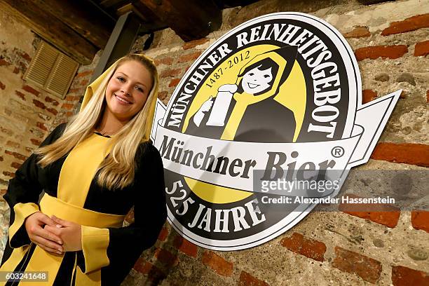 The Muenchner Kindl Oktoberfest female patron Viktoria Ostler poses at the annual beer tasting prior to the 2016 Oktoberfest in the cellar of the...