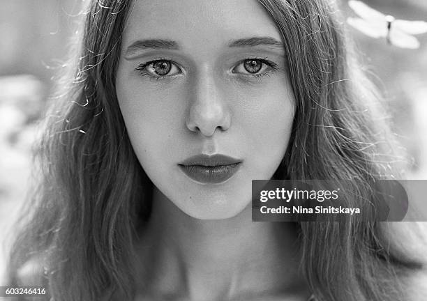 head shot of a cute girl with dragonfly - low contrast stock pictures, royalty-free photos & images