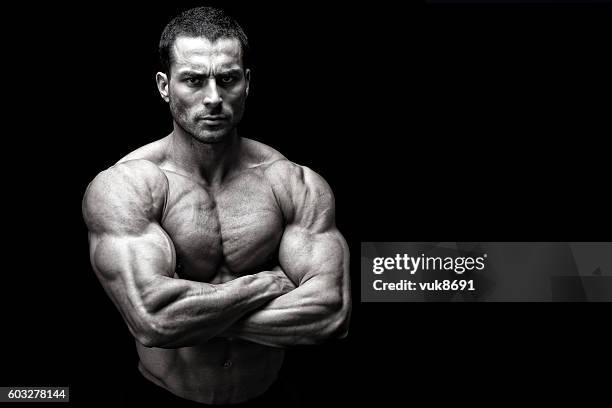 tough guy - angry bodybuilders posing stock pictures, royalty-free photos & images