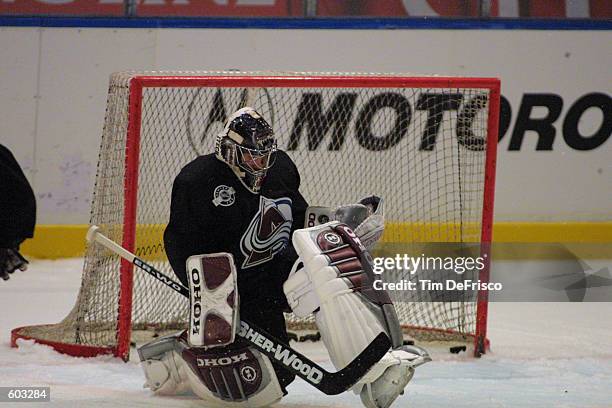 Rookie goaltender Philippe Sauve of the Colorado Avalanche makes a stop during the morning training camp session during the 2001 NHL Challenge Series...