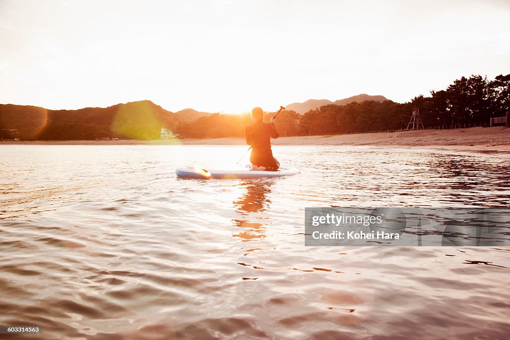 A woman enjoys water sports in the sea