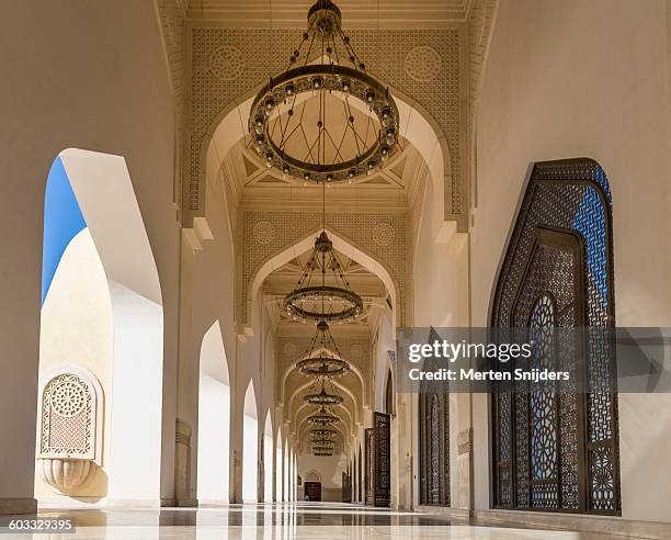 mosque interior corridor with chandeliers - qatar mosque stock pictures, royalty-free photos & images