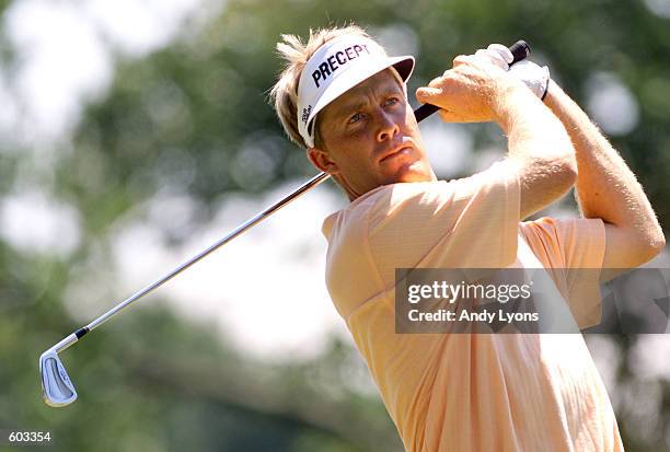 Stuart Appleby hits off the fourth tee during the third round of the 83rd PGA Championship at the Atlanta Country Club in Duluth, Georgia. DIGITAL...
