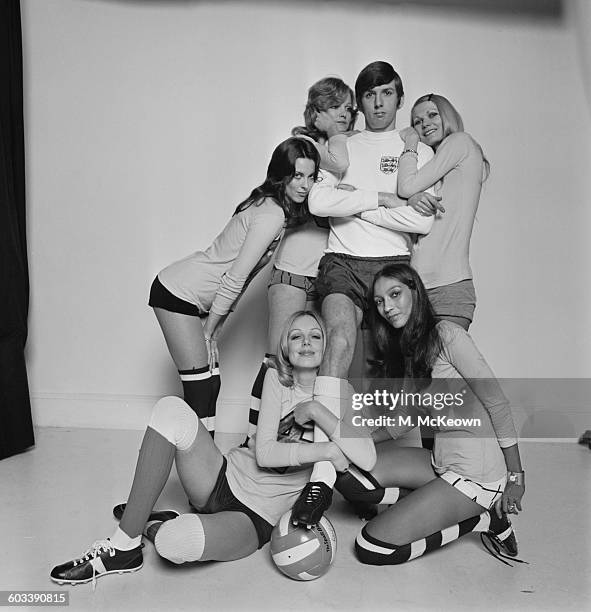 Tottenham Hotspur footballer Martin Peters surrounded by members of the Lumley Lovers ladies football team - Jackie Moody, Bonnie, Sarah Clark,...