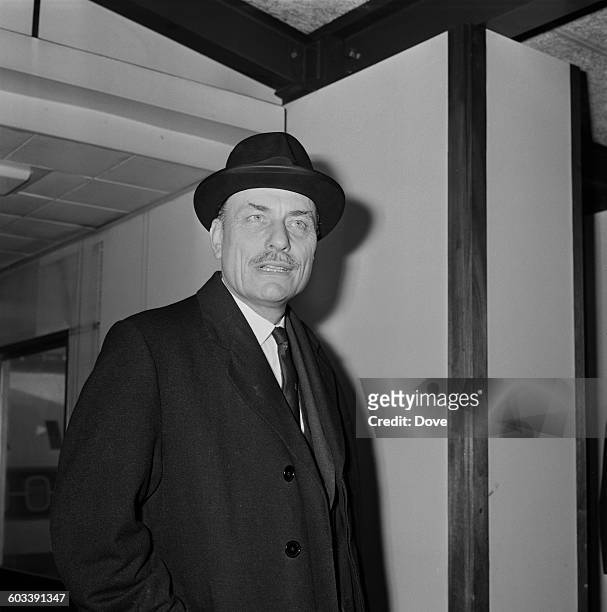 British politician Enoch Powell at London Airport, UK, 13th February 1971.