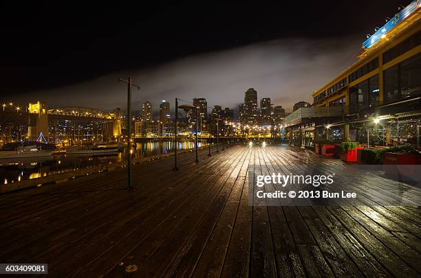 night view of granville island - granville island market foto e immagini stock