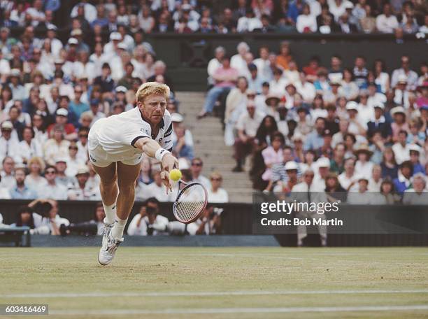 Boris Becker of Germany dives to make a return during the Men's Singles Semi Final of the Wimbledon Lawn Tennis Championship against Goran Ivanisevic...
