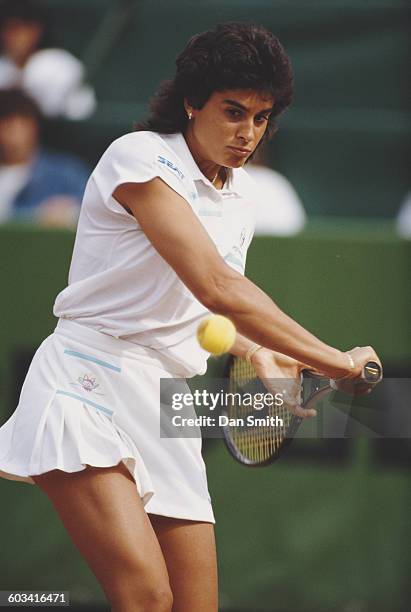 Gabriela Sabatini of Argentina eyes the ball for a back hand return against Arantxa Sanchez Vicario during their Women's Singles Final match at the...