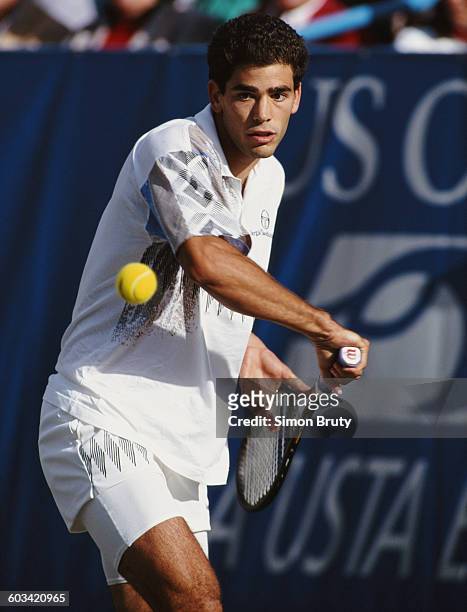 Pete Sampras of the United States returns to Alexander Volkov during their Men's Singles Semi Final match of the United States Open Tennis...