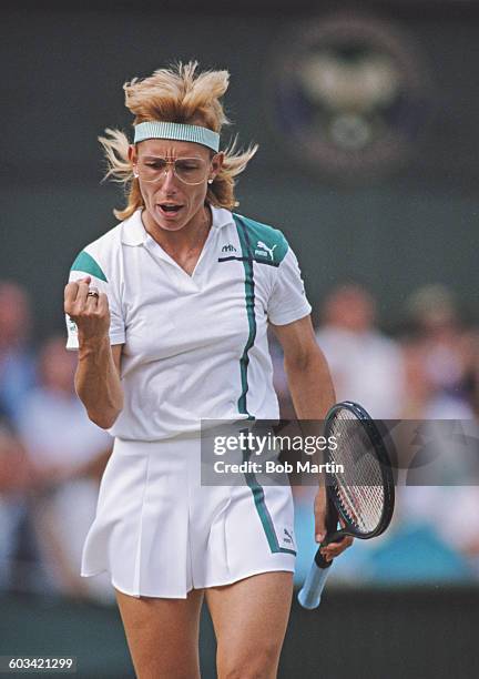 Martina Navratilova of the United States pumps her fist during her Women's Singles Final match against Steffi Graf at the Wimbledon Lawn Tennis...