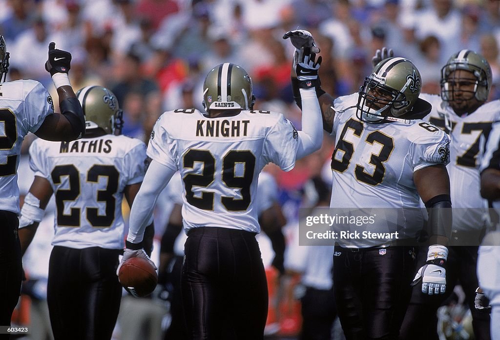 Sammy Knight #29, Jerry Fontenot #62