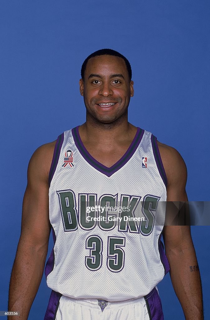 Jason Caffey of the Milwaukee Bucks poses for a studio portrait on ...