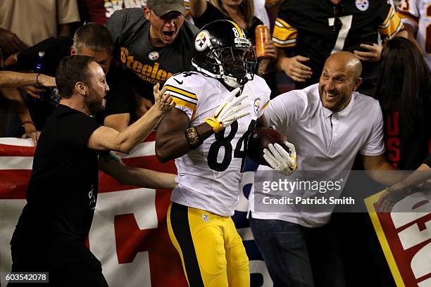 Wide receiver Antonio Brown of the Pittsburgh Steelers celebrates after scoring a second quarter touchdown against the Washington Redskins at...