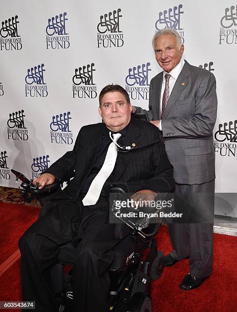 President of The Buoniconti Fund, Marc Buoniconti and Nick Buoniconti attend the 31th Annual Great Sports Legends Dinner to benefit The Buoniconti...
