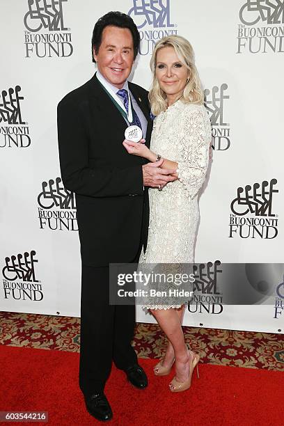 Singer Wayne Newton and Kathleen McCrone attend the 31th Annual Great Sports Legends Dinner to benefit The Buoniconti Fund to Cure Paralysis at The...