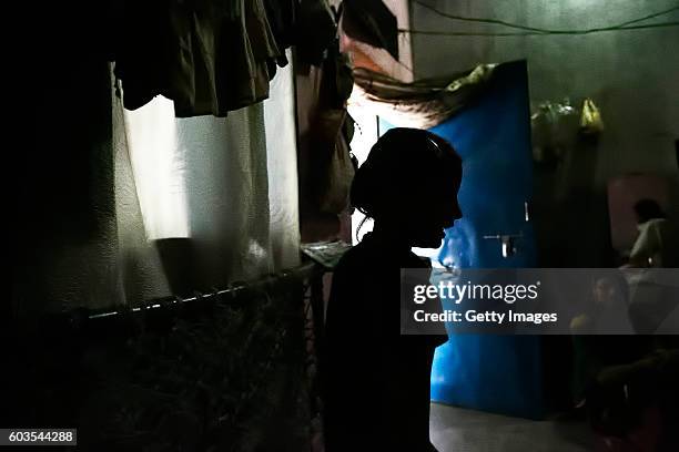 Year old Gitanjali dances in her home on August 1, 2016 in Uttar Pradesh, India. Her 30 year old father sexually abused her for years and raped her...