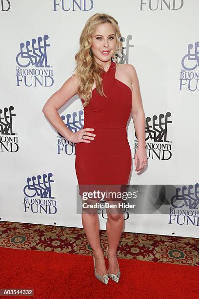 Figure skater Tara Lipinski attends the 31th Annual Great Sports Legends Dinner to benefit The Buoniconti Fund to Cure Paralysis at The Waldorf...