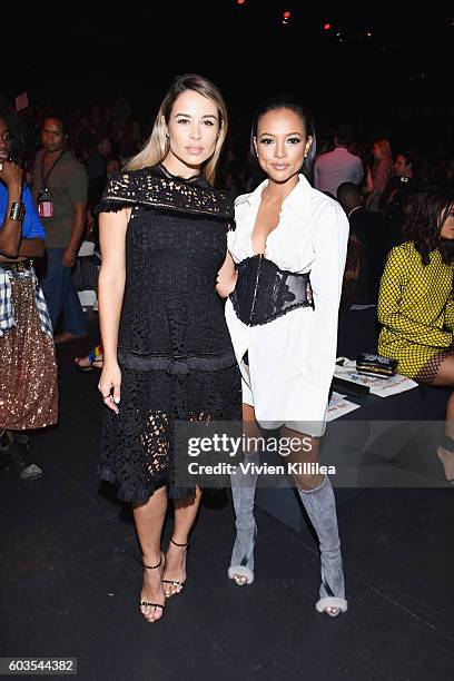 Zulay Henao and Karrueche Tran attend the Vivienne Tam fashion show during New York Fashion Week: The Shows at The Arc, Skylight at Moynihan Station...