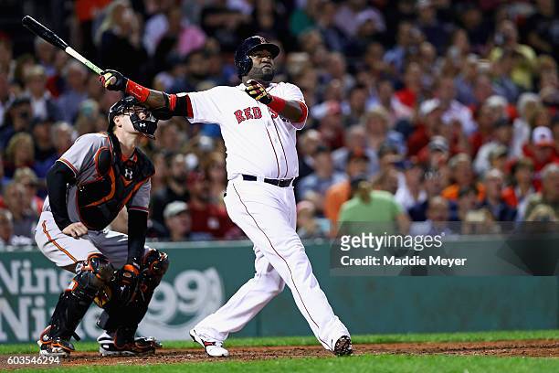David Ortiz of the Boston Red Sox hits a home run during the sixth inning against the Baltimore Orioles at Fenway Park on September 12, 2016 in...