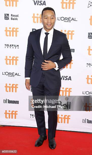 John Legend arrives at the 2016 Toronto International Film Festival - "La La Land" premiere held at Princess of Wales Theatre on September 12, 2016...