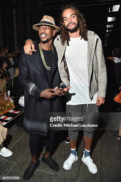 Professional Basketball Players Iman Shumpert and Joakim Noah attend the DKNY Women fashion show during New York Fashion Week: The Shows September...