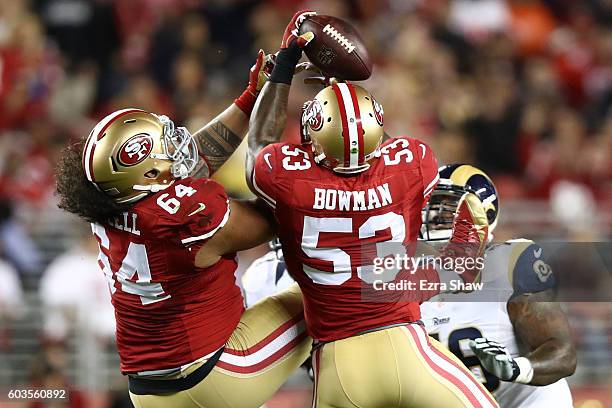 NaVorro Bowman of the San Francisco 49ers intercepts Case Keenum of the Los Angeles Rams during their NFL game at Levi's Stadium on September 12,...