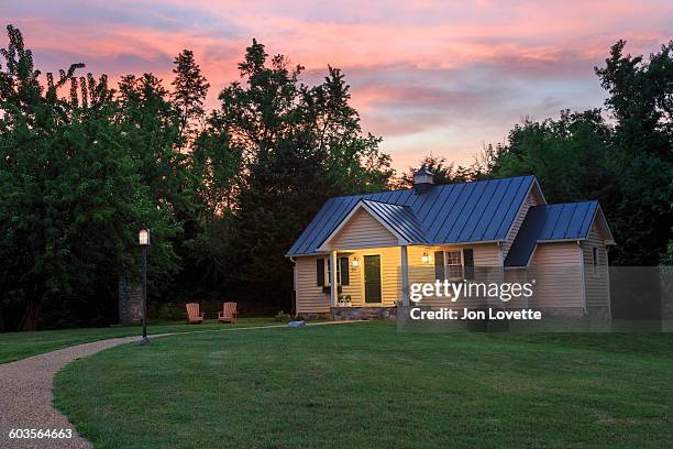 cottage on a hill - cottage ストックフォトと画像